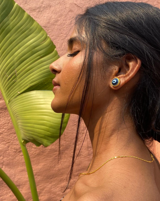 Evil eye stud earrings with protective symbol design - bold statement jewelry for daring style
