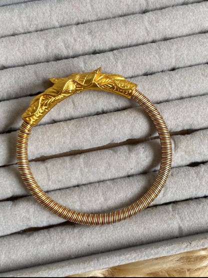 Sin:Khwa Bala panchadhatu bangle in traditional five-metal alloy - handcrafted Nepalese lion bracelet