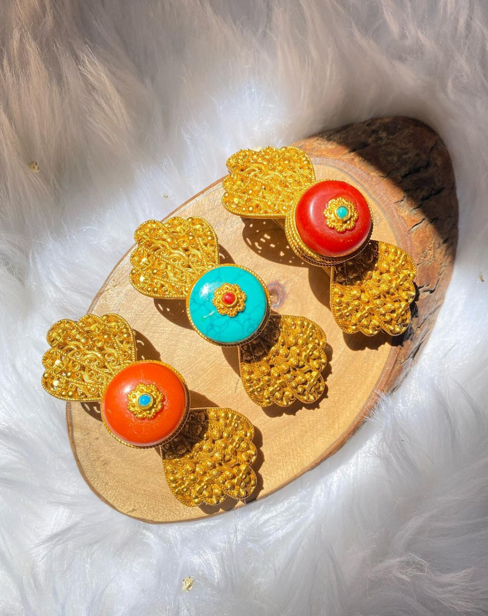 Tibetan hairclips collection in red, orange, and turquoise - traditional hair accessories for special occasions
