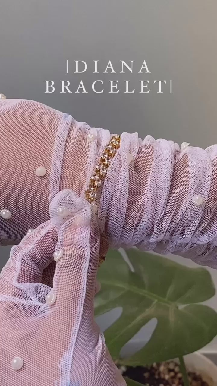 Diana Bracelet elegant gold-toned chain bracelet video showcasing intricate detailing and sophisticated design - luxury jewelry for formal occasions
