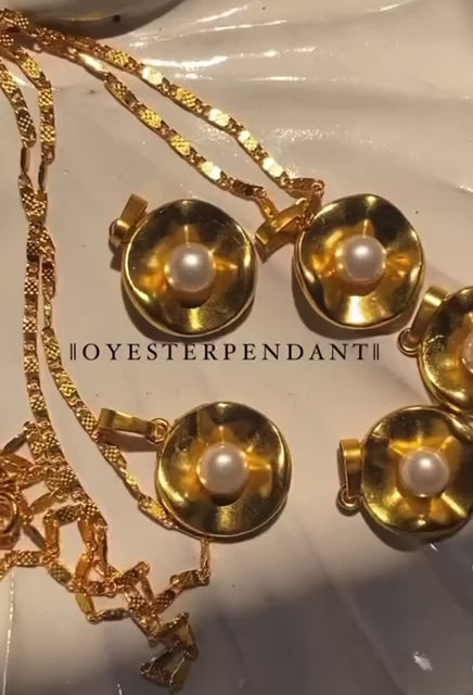 Oyster pendant necklace in gold tone - elegant pearl jewelry with timeless design